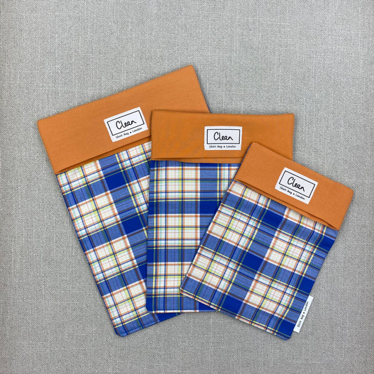 Blue, yellow & orange check on white with orange top