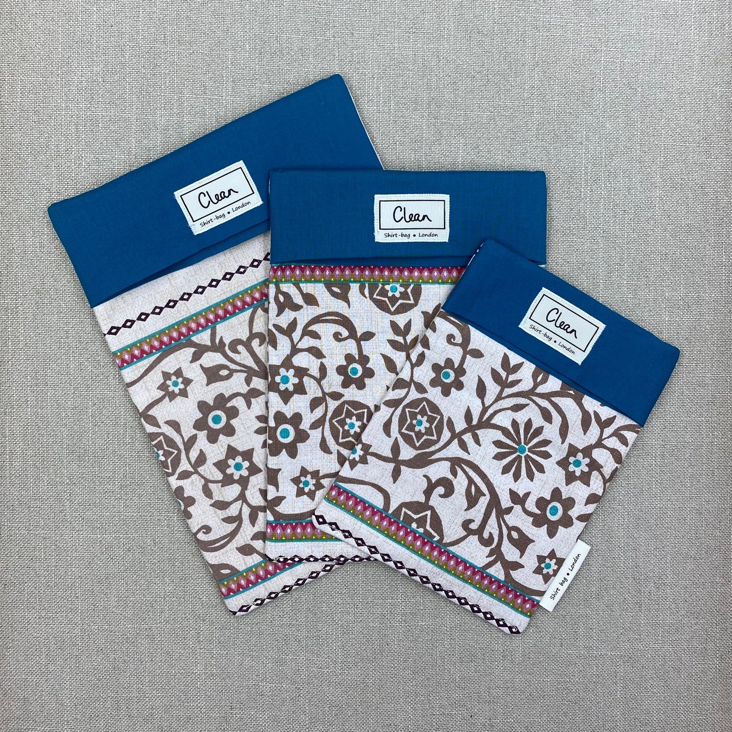 Brown flowers on cream with teal top