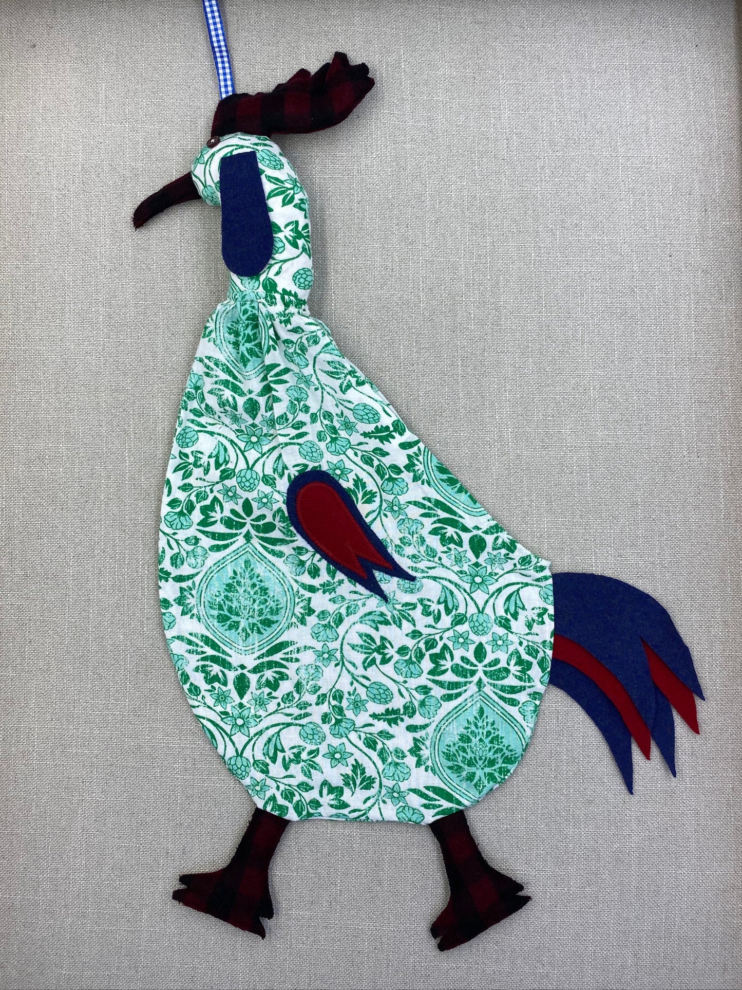 Green flowers on white with red tartan, blue & red