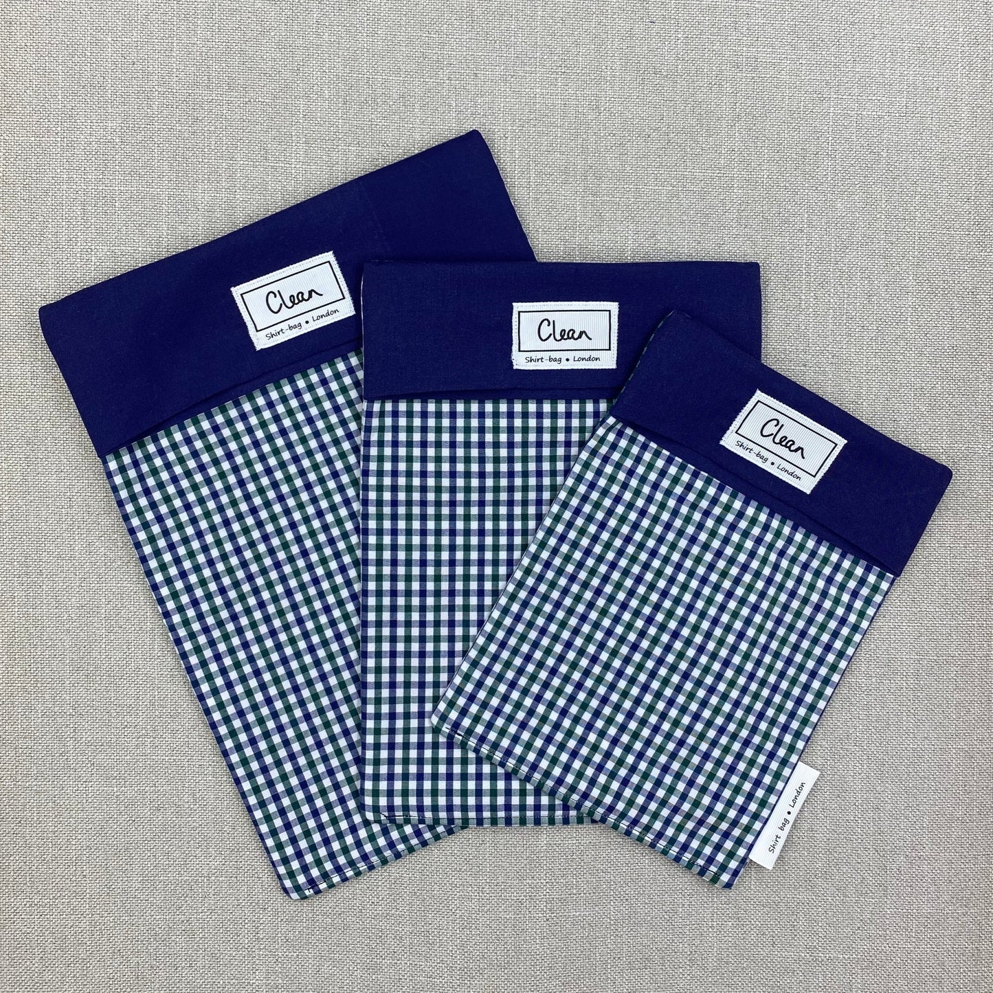 Navy, green & white check with navy top