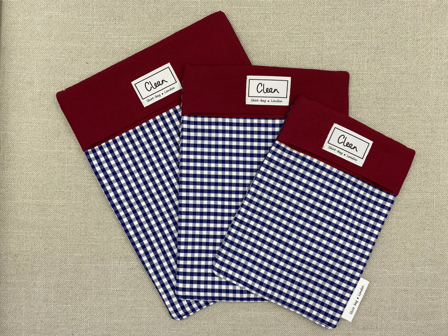 Navy & white check with dark red top