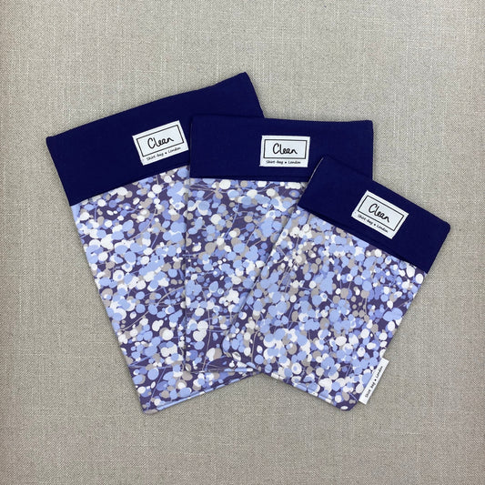 Purple, lilac & white with navy top
