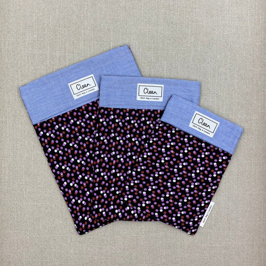 Purple & white spots on black  with blue top