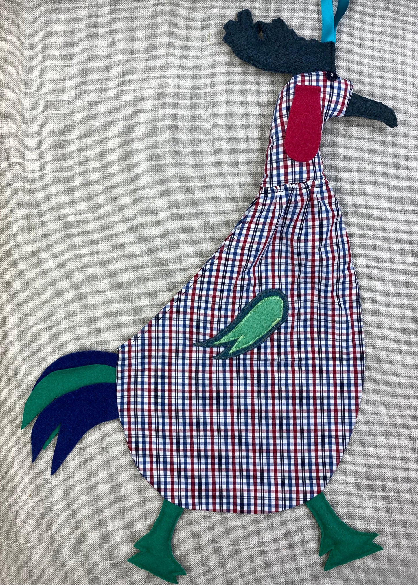 Red, blue & black tartan on white with sea green, red, green & blue.jpeg