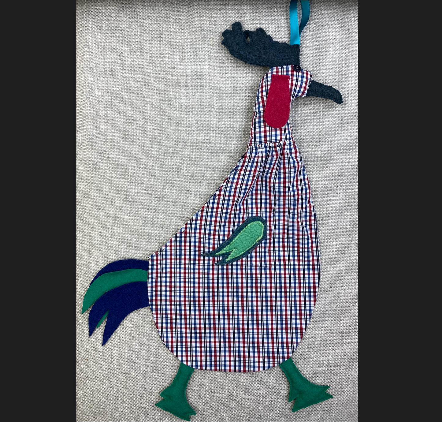 Red, blue & black tartan on white with sea green, red, green & blue