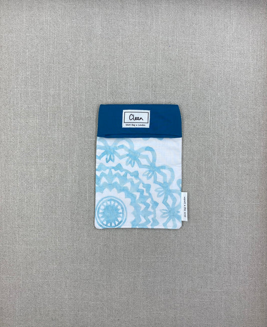 Aqua flower on white with teal top - small