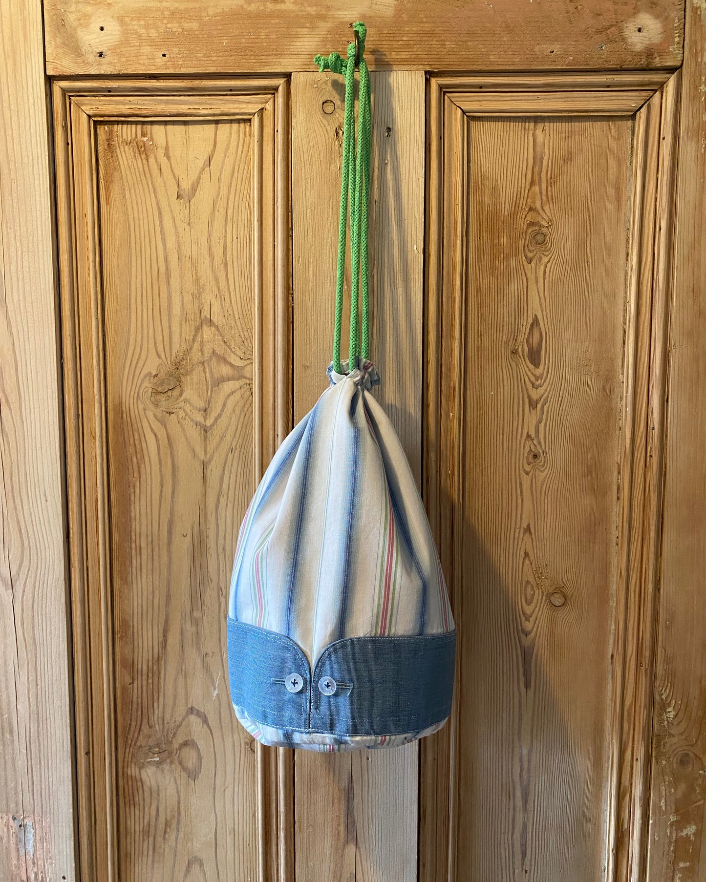 Duffle - Blue, green & red stipe with blue cuffs.jpeg