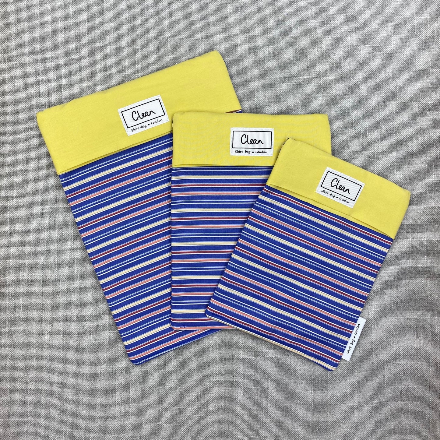 Blue, orange & yellow stripes with yellow top