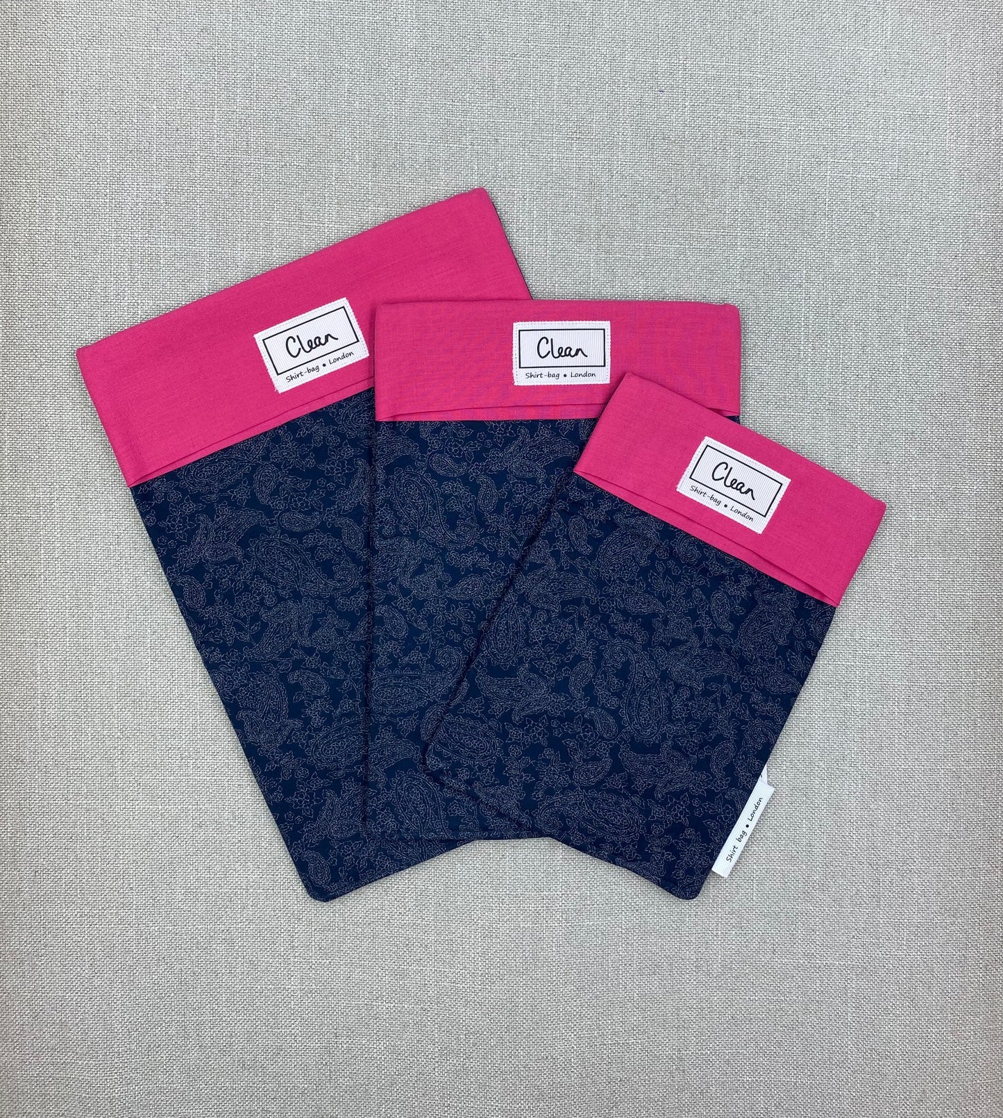 Grey paisley on navy with cerise top