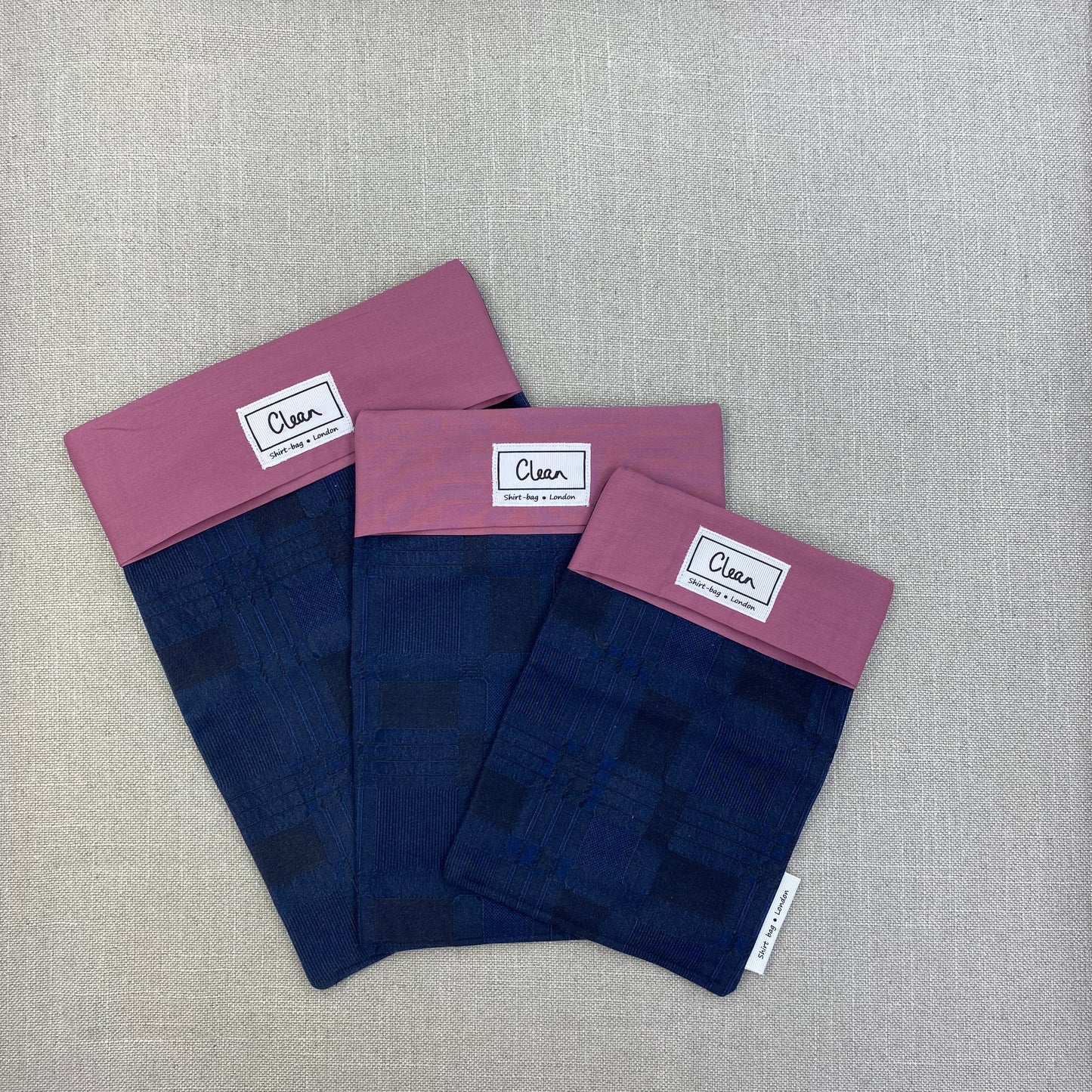Embossed navy pattern with damson top
