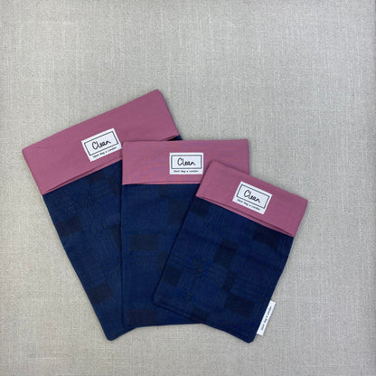 Embossed navy pattern with damson top