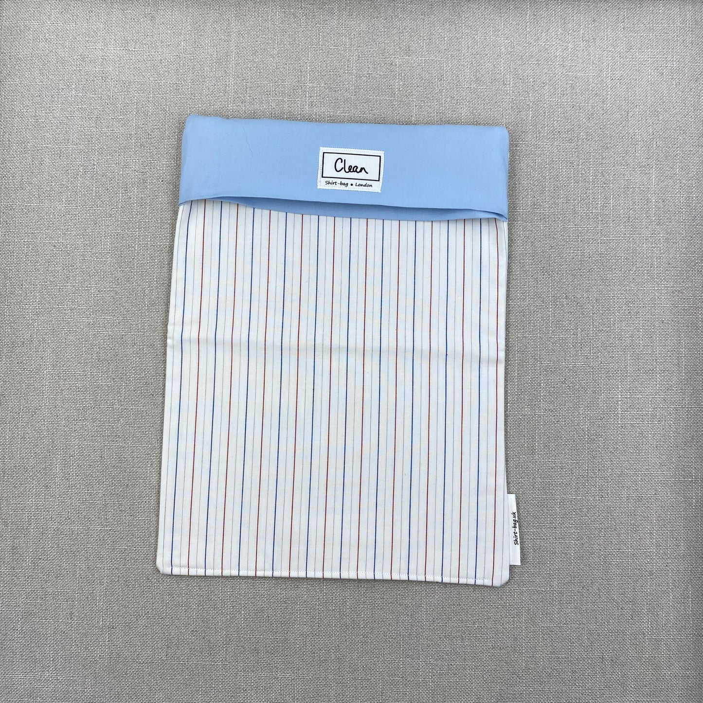 Red & blue pinstripe vertical on white with pale blue top - X large