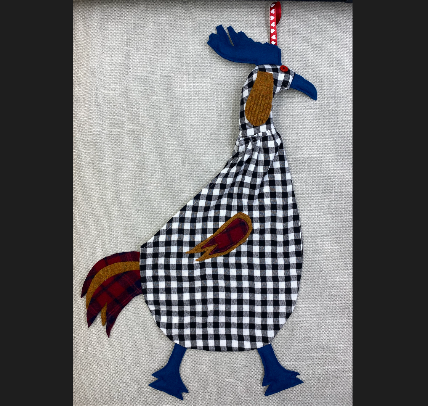 Black & white check with blue, gold & red tartan